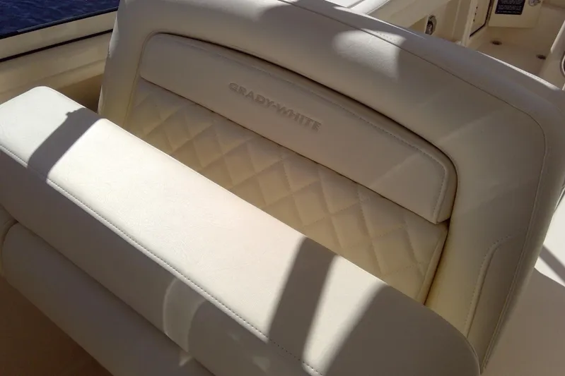  Yacht Photos Pics 2023 Grady-White Freedom 285 boat seat with quilted design and logo.