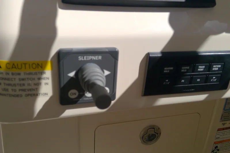  Yacht Photos Pics Control panel of 2023 Grady-White Freedom 285 boat with joystick and buttons.