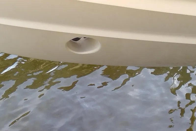  Yacht Photos Pics 2023 Grady-White Freedom 285 boat hull above water surface.