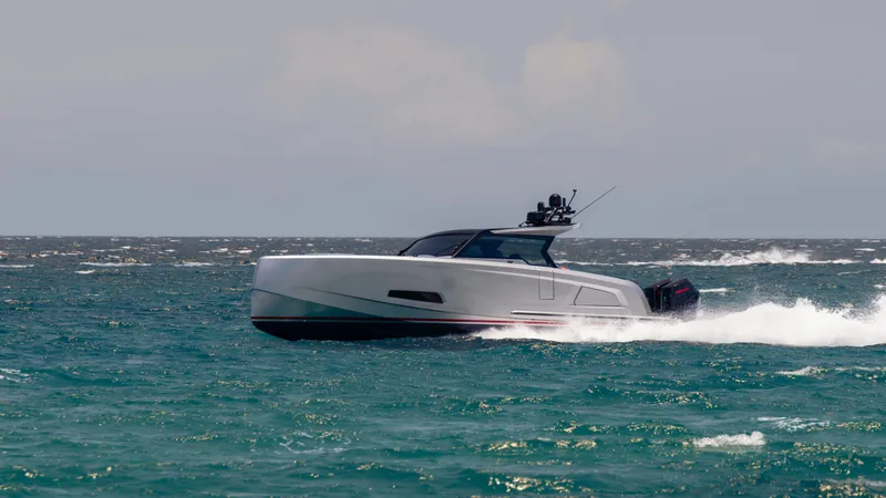 Robin's Nest Yacht Photos Pics 2023 Vanquish Yachts VQ45 cruising on open water.