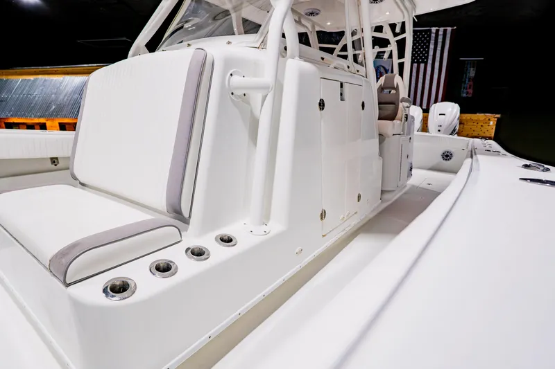  Yacht Photos Pics 2012 Yellowfin 39 Offshore boat interior with seating and rod holders.