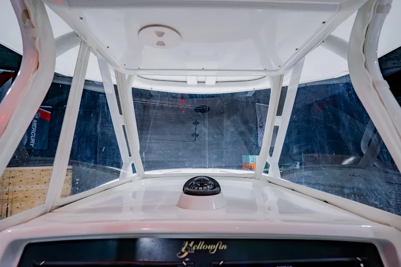  Yacht Photos Pics 2012 Yellowfin 39 Offshore boat interior with compass and windshield view.