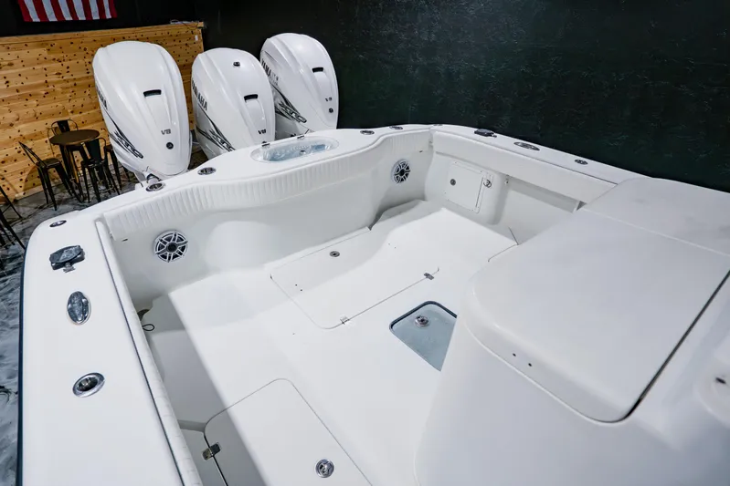  Yacht Photos Pics 2012 Yellowfin 39 Offshore boat interior with triple Yamaha V8 engines.