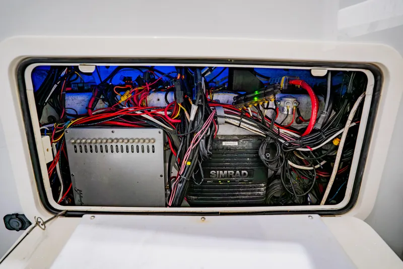  Yacht Photos Pics Electrical system inside 2012 Yellowfin 39 Offshore boat, featuring Simrad equipment and wiring.