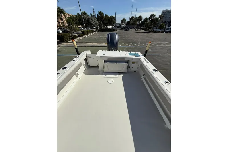  Yacht Photos Pics 2023 Parker 2320 Sport Cabin boat interior, featuring spacious deck and modern design.