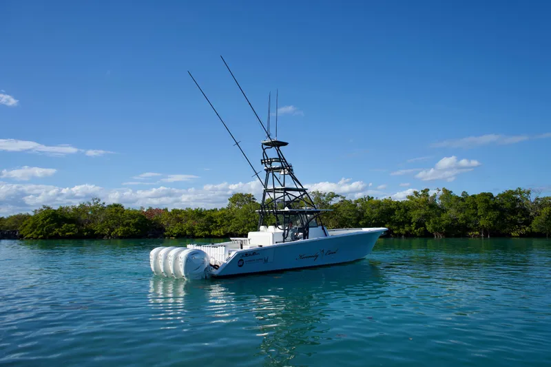  Yacht Photos Pics 2019 SeaHunter 45 Tournament boat on calm water under clear blue sky.