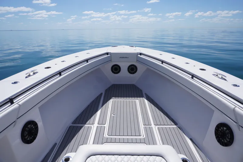  Yacht Photos Pics 2019 SeaHunter 45 Tournament boat deck on calm ocean under blue sky.