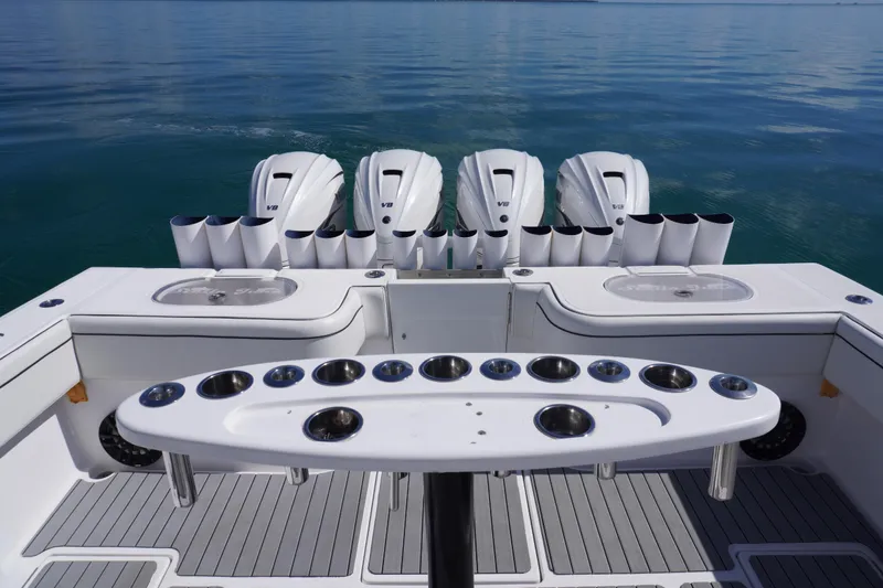  Yacht Photos Pics 2019 SeaHunter 45 Tournament boat with multiple outboard engines on calm water.