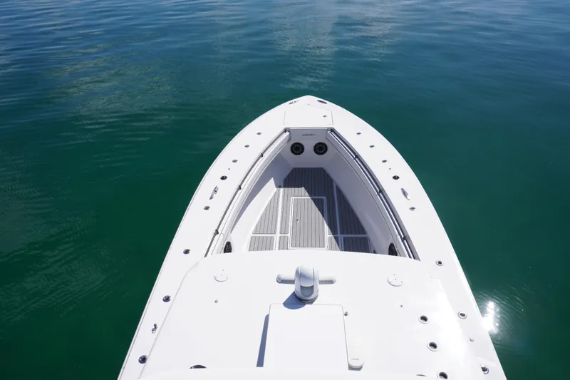  Yacht Photos Pics 2019 SeaHunter 45 Tournament boat on calm water, showcasing sleek design and spacious deck.