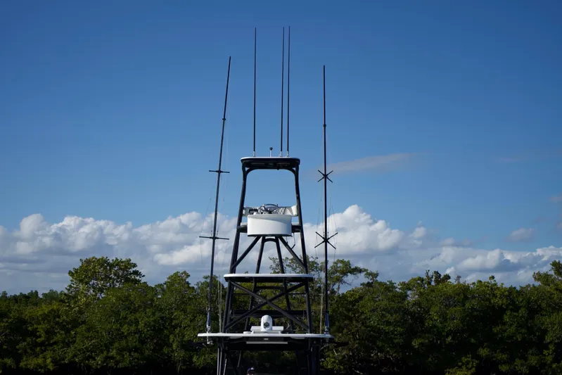  Yacht Photos Pics Radar tower of 2019 SeaHunter 45 Tournament against blue sky and clouds.