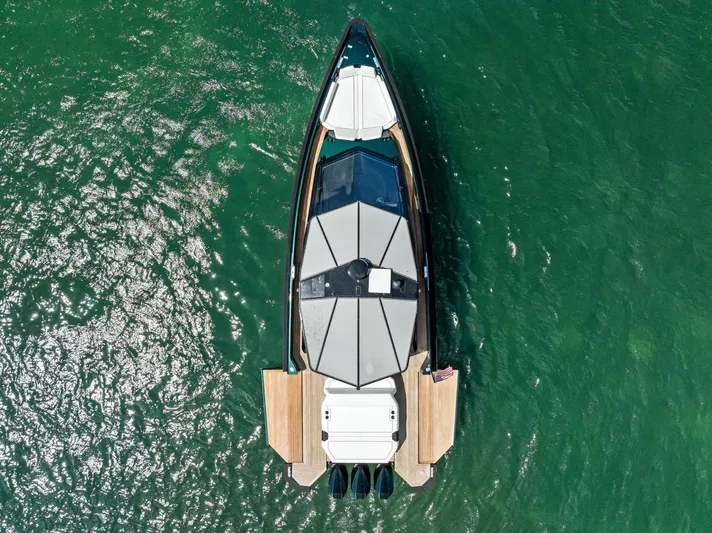 Green Eyes Yacht Photos Pics Overhead view of 2023 Wally Wallytender 43X yacht on green water.