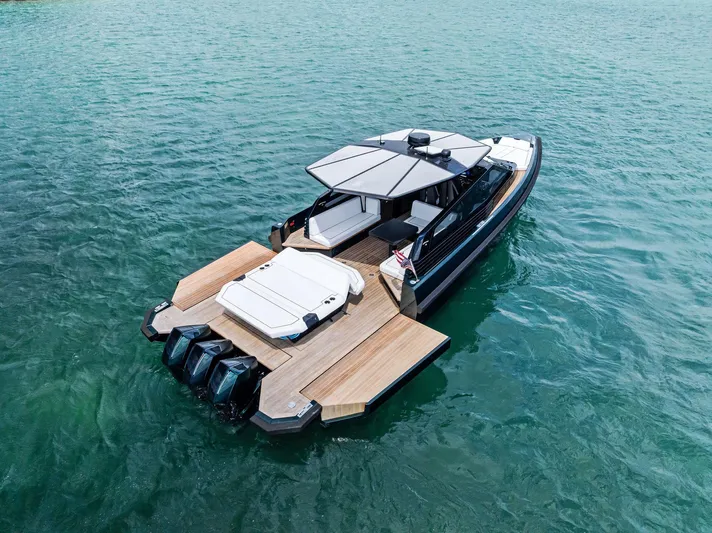 Green Eyes Yacht Photos Pics 2023 Wally Wallytender 43X luxury yacht on serene water, featuring sleek design and spacious deck.