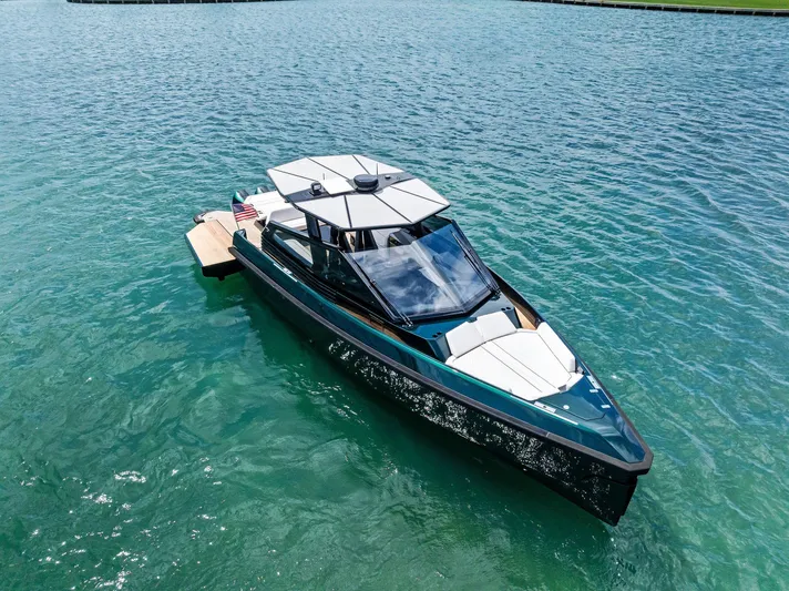 Green Eyes Yacht Photos Pics 2023 Wally Wallytender 43X luxury yacht on clear blue water.