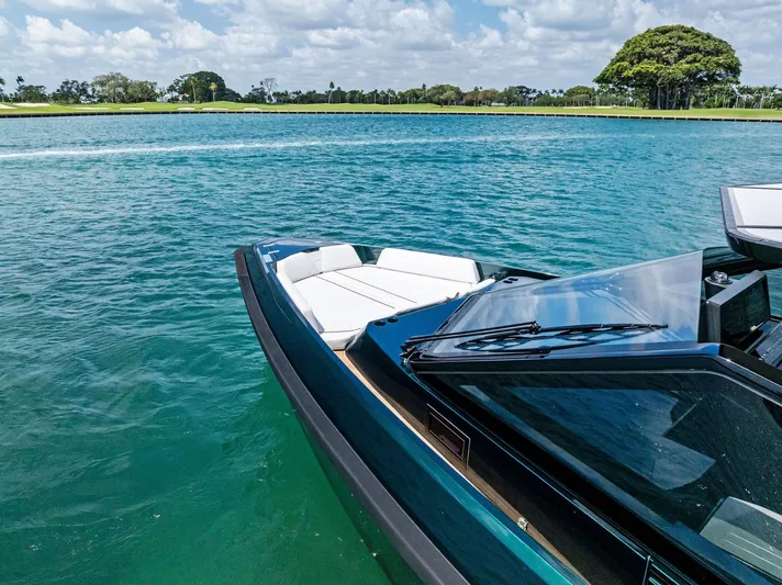 Green Eyes Yacht Photos Pics 2023 Wally Wallytender 43X luxury boat on clear blue water.