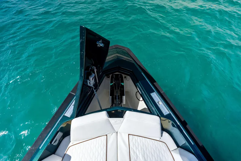 Green Eyes Yacht Photos Pics 2023 Wally Wallytender 43X yacht with open hatch on turquoise water.