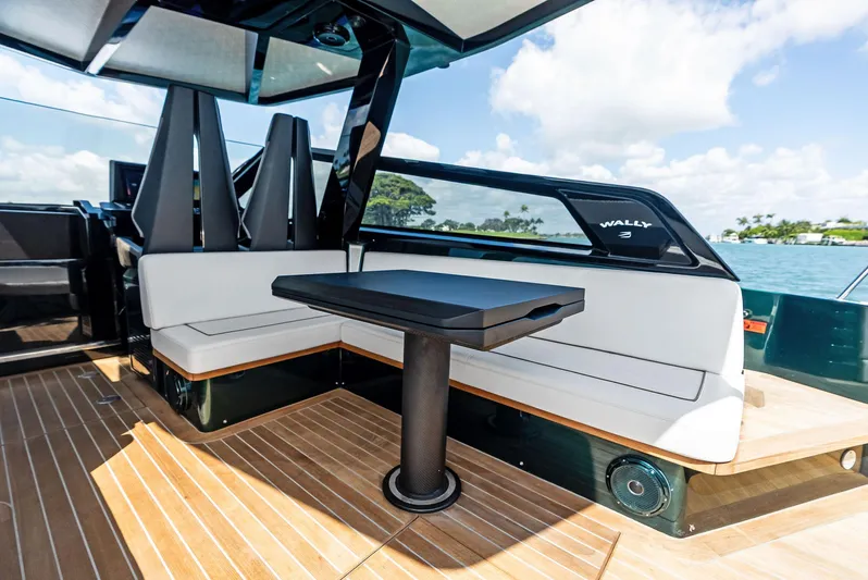 Green Eyes Yacht Photos Pics Luxurious seating area on 2023 Wally Wallytender 43X yacht with sleek design.