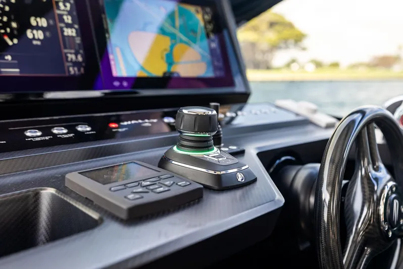 Green Eyes Yacht Photos Pics Control panel of 2023 Wally Wallytender 43X yacht with navigation display and joystick.