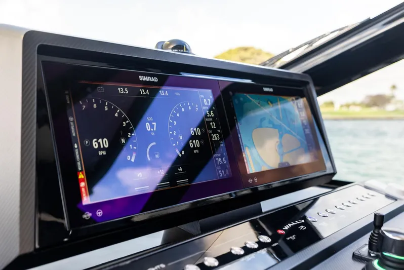 Green Eyes Yacht Photos Pics 2023 Wally Wallytender 43X dashboard with navigation and control screens.