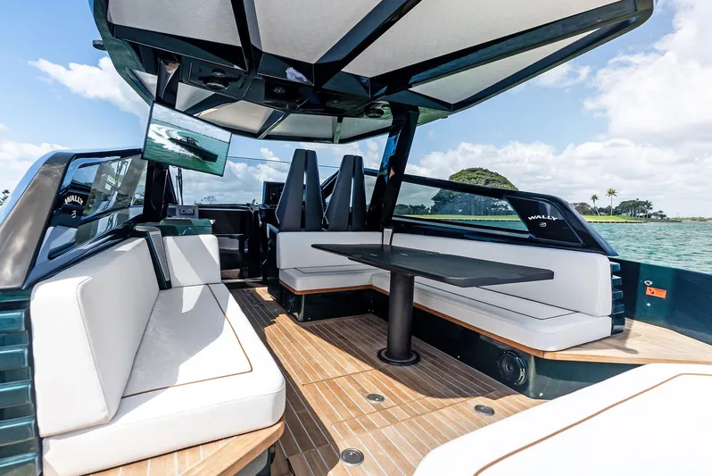 Green Eyes Yacht Photos Pics Luxurious 2023 Wally Wallytender 43X yacht interior with sleek seating and modern design.