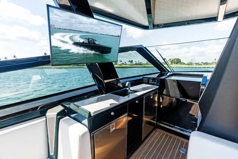 Green Eyes Yacht Photos Pics Luxurious interior of 2023 Wally Wallytender 43X yacht with sleek design and modern amenities.