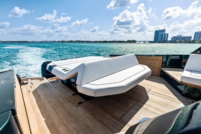 Green Eyes Yacht Photos Pics 2023 Wally Wallytender 43X luxury yacht with sleek deck design cruising on blue waters.