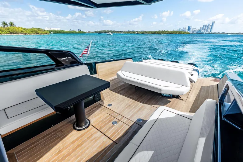 Green Eyes Yacht Photos Pics 2023 Wally Wallytender 43X yacht with sleek deck, cruising on turquoise waters.