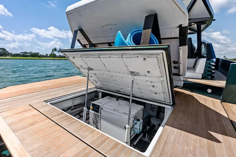 Green Eyes Yacht Photos Pics 2023 Wally Wallytender 43X yacht with open storage compartment on deck.