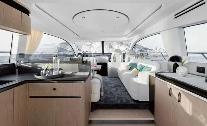  Yacht Photos Pics Luxurious interior of 2024 Azimut 53 Fly yacht with modern furnishings and panoramic windows.