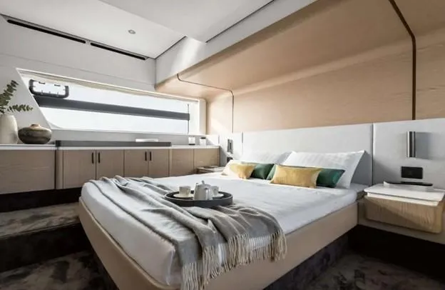  Yacht Photos Pics Luxurious bedroom interior of 2024 Azimut 53 Fly yacht with modern design and elegant decor.