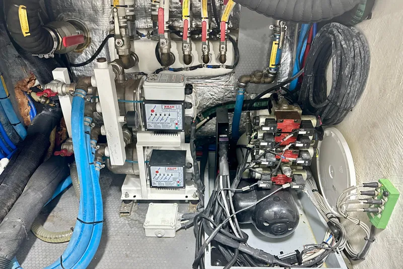  Yacht Photos Pics Engine room of 2016 Absolute 72 FLY yacht with complex wiring and machinery.