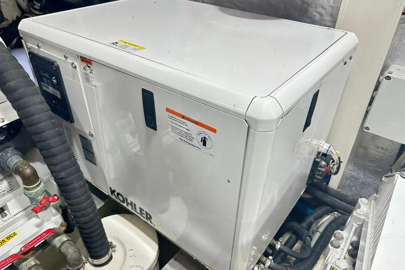  Yacht Photos Pics Engine room of 2016 Absolute 72 FLY yacht featuring Kohler generator.