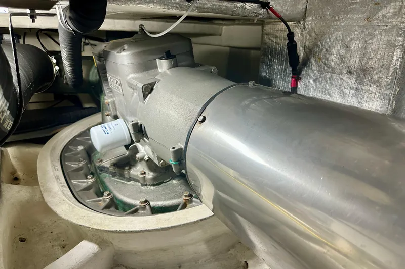  Yacht Photos Pics Engine room of a 2016 Absolute 72 FLY yacht, showcasing mechanical components.