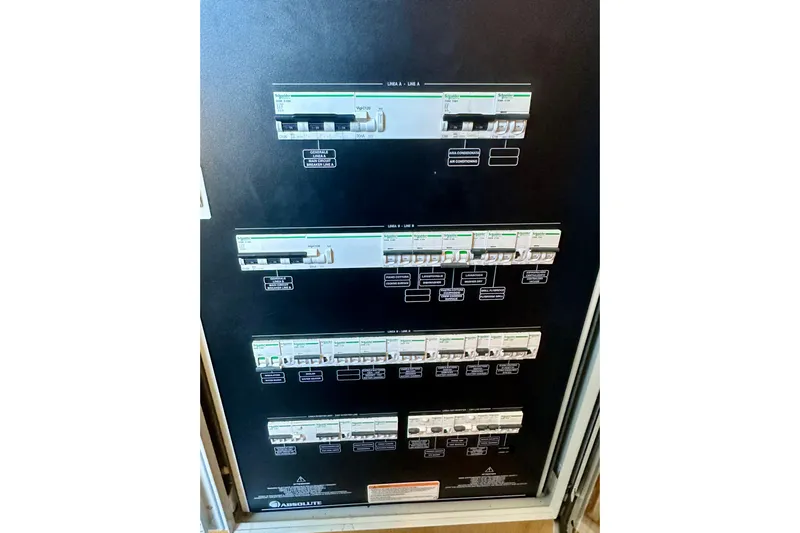  Yacht Photos Pics Electrical panel on Absolute 72 FLY yacht, 2016 model, featuring multiple circuit breakers.