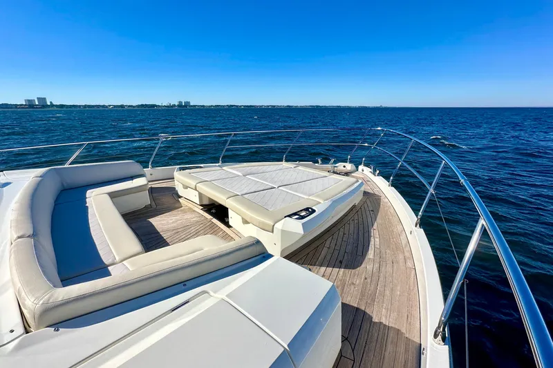  Yacht Photos Pics Luxurious 2016 Absolute 72 FLY yacht deck with ocean view and seating area.
