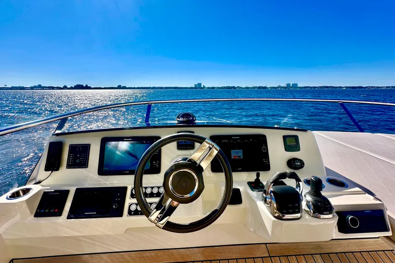  Yacht Photos Pics Cockpit view of 2016 Absolute 72 FLY yacht with ocean backdrop.