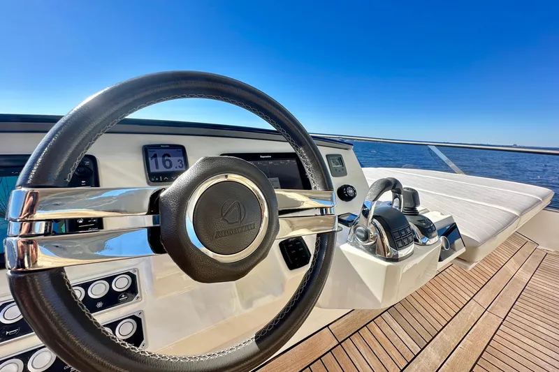  Yacht Photos Pics Steering wheel and controls of 2016 Absolute 72 FLY yacht, with ocean view.