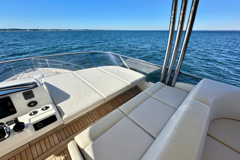  Yacht Photos Pics Luxurious 2016 Absolute 72 FLY yacht deck with ocean view and elegant seating.