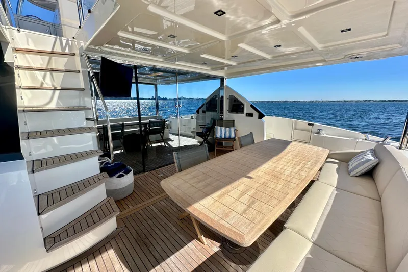  Yacht Photos Pics Luxurious 2016 Absolute 72 FLY yacht with spacious deck and elegant seating area.