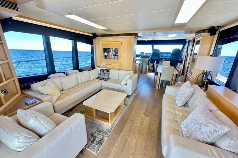  Yacht Photos Pics Luxurious interior of 2016 Absolute 72 FLY yacht with elegant seating and ocean view.