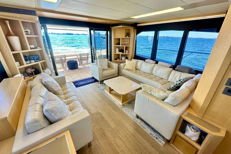  Yacht Photos Pics Luxurious interior of 2016 Absolute 72 FLY yacht with ocean view and elegant seating.