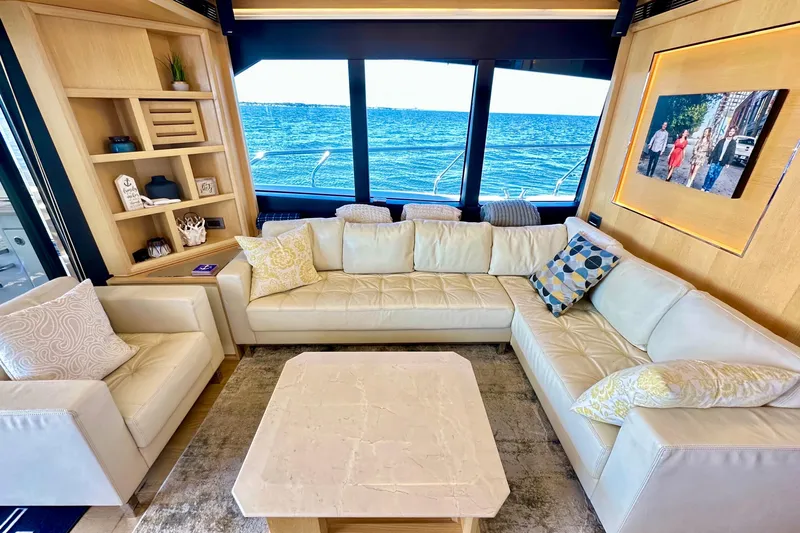  Yacht Photos Pics Luxurious interior of 2016 Absolute 72 FLY yacht with elegant seating and ocean view.