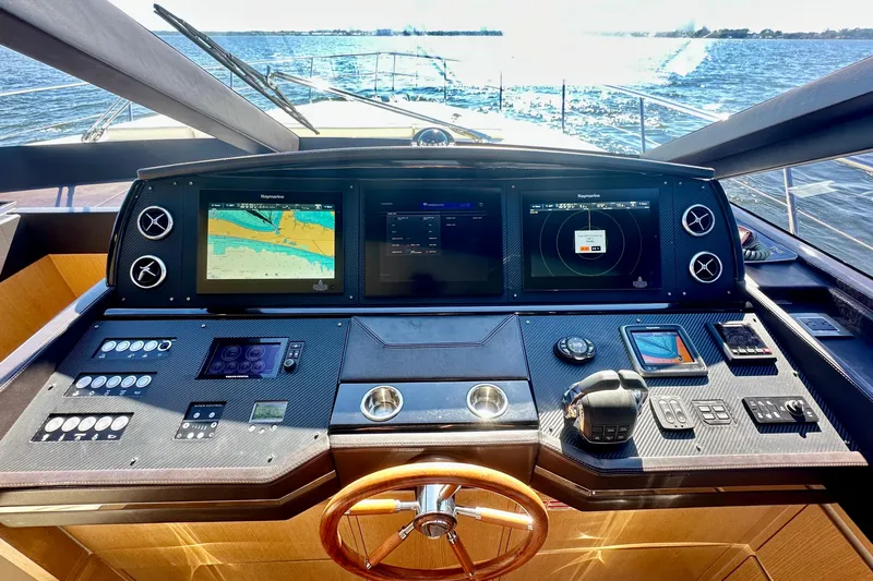  Yacht Photos Pics Cockpit of 2016 Absolute 72 FLY yacht with advanced navigation systems and controls.