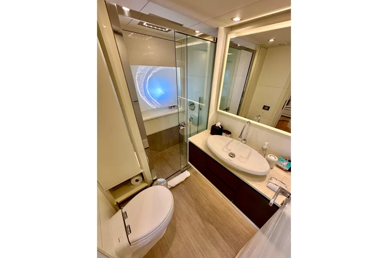  Yacht Photos Pics Luxurious bathroom in 2016 Absolute 72 FLY yacht with modern fixtures and elegant design.