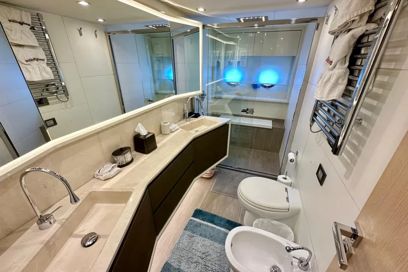  Yacht Photos Pics Luxurious bathroom in 2016 Absolute 72 FLY yacht with modern fixtures and elegant design.