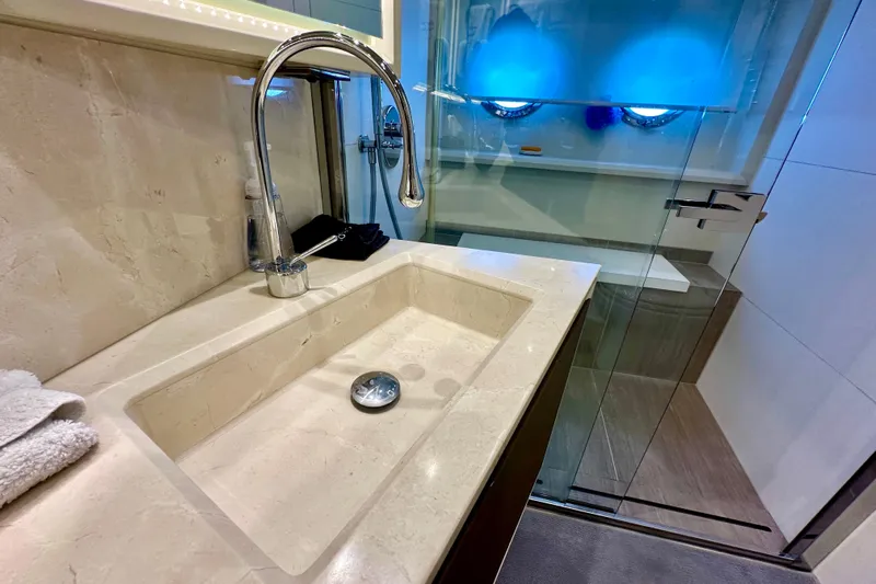  Yacht Photos Pics Luxurious bathroom sink and shower in 2016 Absolute 72 FLY yacht.
