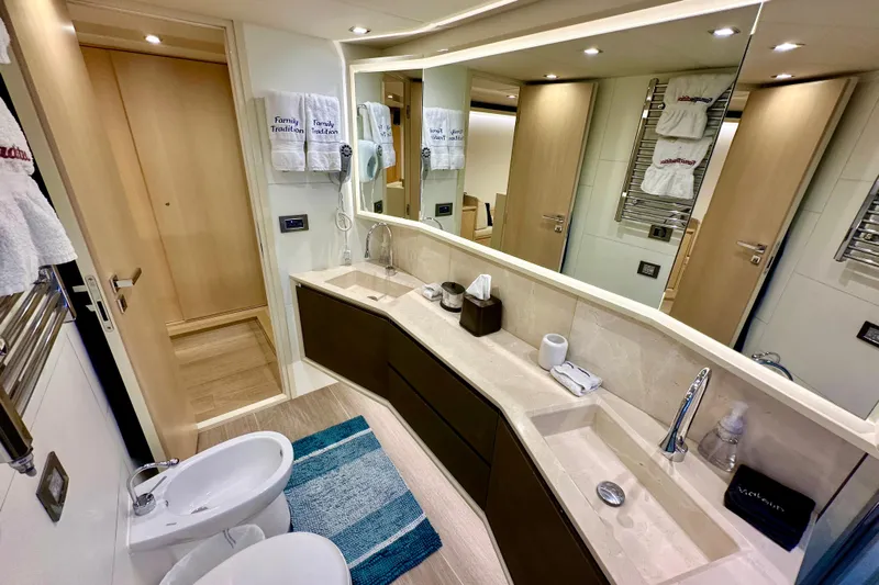  Yacht Photos Pics Luxurious bathroom in 2016 Absolute 72 FLY yacht with modern fixtures and elegant design.