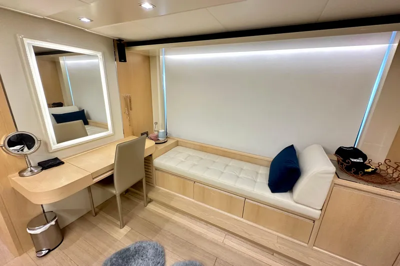  Yacht Photos Pics Luxurious interior of 2016 Absolute 72 FLY yacht with elegant vanity and seating area.