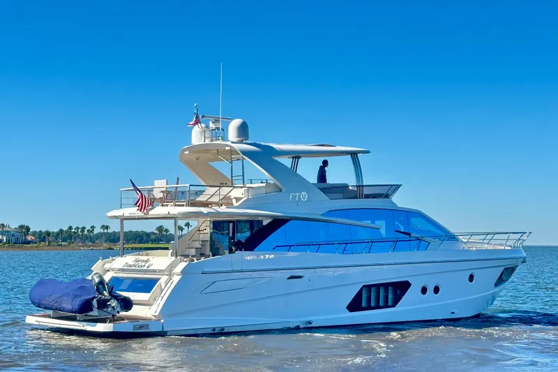  Yacht Photos Pics Luxurious 2016 Absolute 72 FLY yacht cruising on a sunny day.
