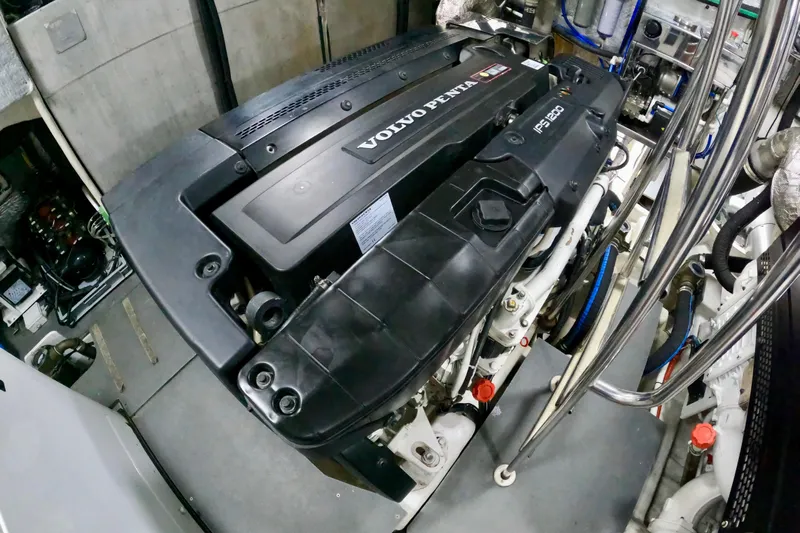  Yacht Photos Pics Engine room of a 2016 Absolute 72 FLY yacht featuring a Volvo Penta engine.
