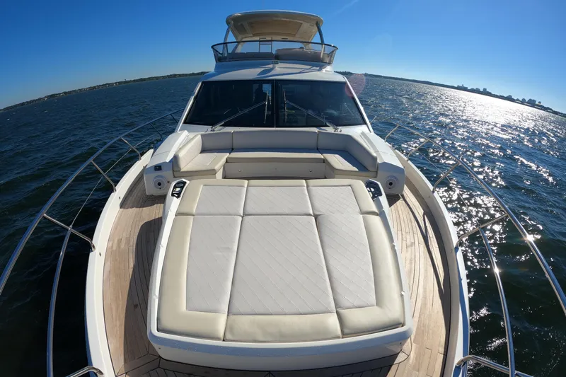  Yacht Photos Pics Luxurious 2016 Absolute 72 FLY yacht with spacious sun deck on open water.